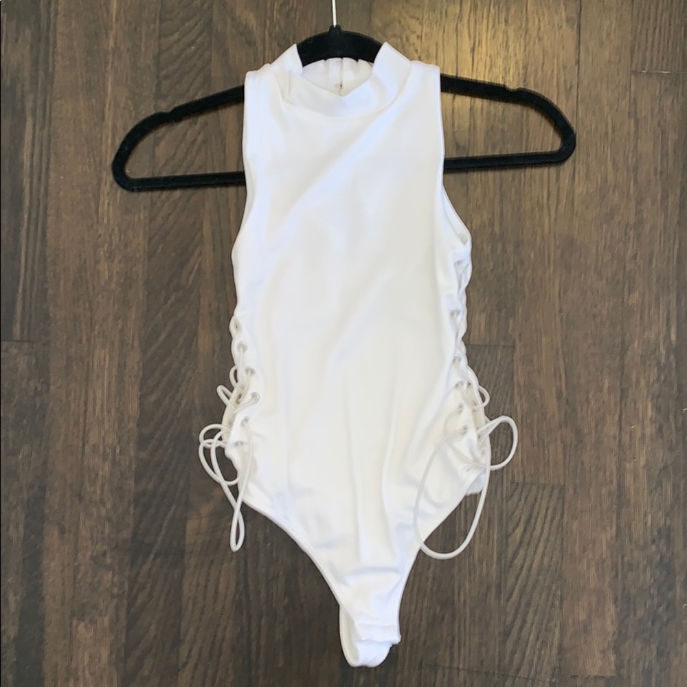 NASTY GAL WHITE LACE UP BODYSUIT SIZE XS NEW!